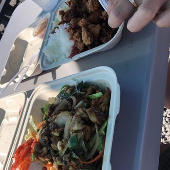 Thai Mee up - I don't quite remember the name of the plates, but one was lemon grass fried chicken and some chicken with peanuts and veggies. - Thai Near Me - Kula, Hawaii