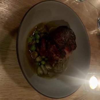 Lawrence - BBQ lamb neck with broad beans and (I think) peas in broth - Modern European Near Me - Montreal, Quebec