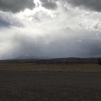 Bear Valley RV & Camping Resort - Storm blowing in behind the horse stalls - Campgrounds Near Me - Panguitch, Utah