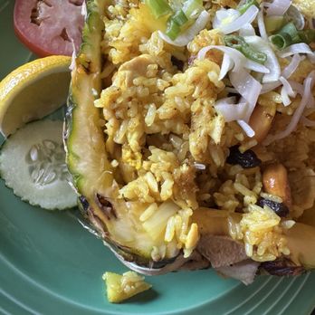 Andaman Thai - The pineapple fried rice, while served in a carved-out pineapple (a visual win), was 90% rice with sparse protein - Thai Near Me - Walnut Creek, California