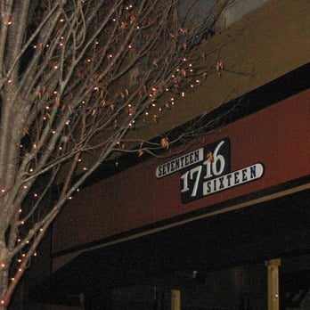 17-16 - the outside of a restaurant at night - Bars Near Me - Auburn, Alabama
