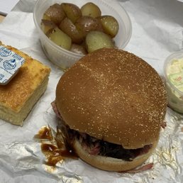 My lunch, pulled pork bbq sandwich, with roasted redskin potatoes, coleslaw, and cornbread with salted butter. My lunch, pulled pork bbq sandwich, with roasted redskin potatoes, coleslaw, and cornbread with salted butter.