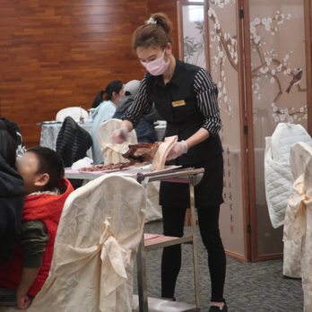 Lobster Port - Server preparing Peking duck servings tableside. - Dim Sum Near Me - Markham, Ontario