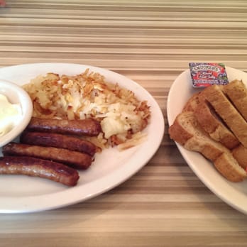 aMa Bistro - Two poached eggs, sausages, hashbrowns and toast! All this for $5! Totally recommend this $5 breakfast special! :-) - Breakfast & Brunch Near Me - Ann Arbor, Michigan