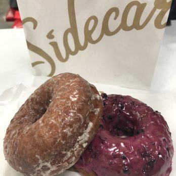 Sidecar Doughnuts & Coffee - Salt & Butter Doughnut on the top, and Huckleberry Doughnut on the bottom - Must try the Salt&Butter!!! - Donuts Near Me - Costa Mesa, California Sidecar Doughnuts & Coffee - Salt & Butter Doughnut on the top, and Huckleberry Doughnut on the bottom - Must try the Salt&Butter!!! - Donuts Near Me - Costa Mesa, California