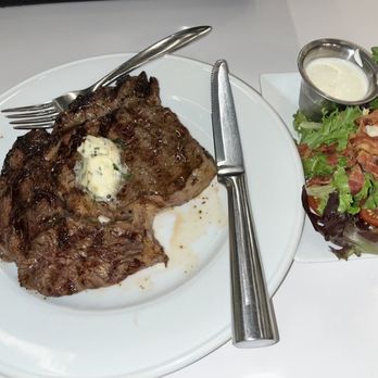 Michael's Restaurant - Delmonico with savory salad - Steakhouses Near Me - Birmingham, Alabama Michael's Restaurant - Delmonico with savory salad - Steakhouses Near Me - Birmingham, Alabama