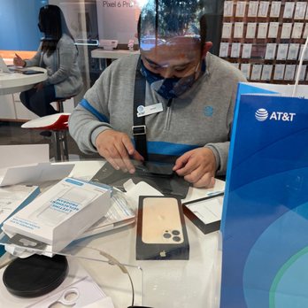 AT&T Store - Jarem putting on screen protectors! - Mobile Phones Near Me - Irvine, California