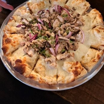 Poor Richards Pizza - Our garlic chicken pile pizza - Pizza Near Me - Hanford, California Poor Richards Pizza - Our garlic chicken pile pizza - Pizza Near Me - Hanford, California