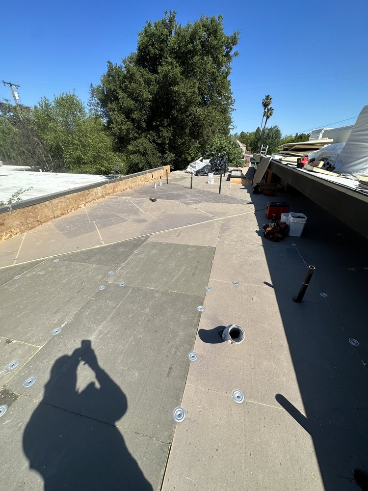 Slide of Samperios Roofing