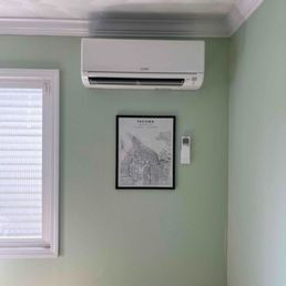 Mini Split in my living room. The unit is level my walls are not because it's a 1940's home.