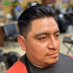 Mia Unisex Salon - Hair cut by a barber