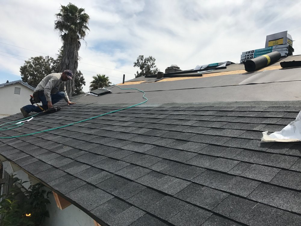 Slide of Husky Roofing