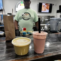 One of the owners Earnest and delicious cauliflower curry soup and a PBJ& Strawberry Smoothie with vegan protein! One of the owners Earnest and delicious cauliflower curry soup and a PBJ& Strawberry Smoothie with vegan protein!