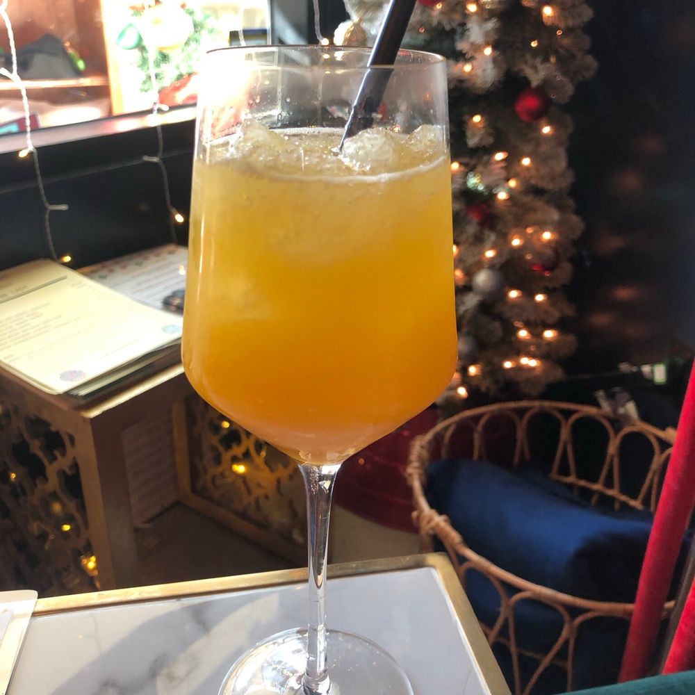 Rocks & Drams - Passionfruit and vodka cocktail in place of the Bad Santa from their holiday menu - Cocktail Bars Near Me - Ventura, California Rocks & Drams - Passionfruit and vodka cocktail in place of the Bad Santa from their holiday menu - Cocktail Bars Near Me - Ventura, California