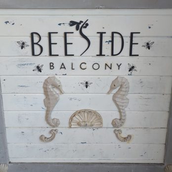 Beeside Balcony - Business logo on the front of the hostess stand - Mediterranean Near Me - Del Mar, California Beeside Balcony - Business logo on the front of the hostess stand - Mediterranean Near Me - Del Mar, California