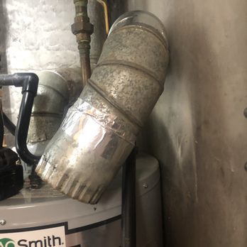 Alexanders Proficient Heating & Cooling - This is where he left the rest of exhaust pipe, on top of water heater - Heating & Air Conditioning/HVAC Near Me - Brooklyn, New York