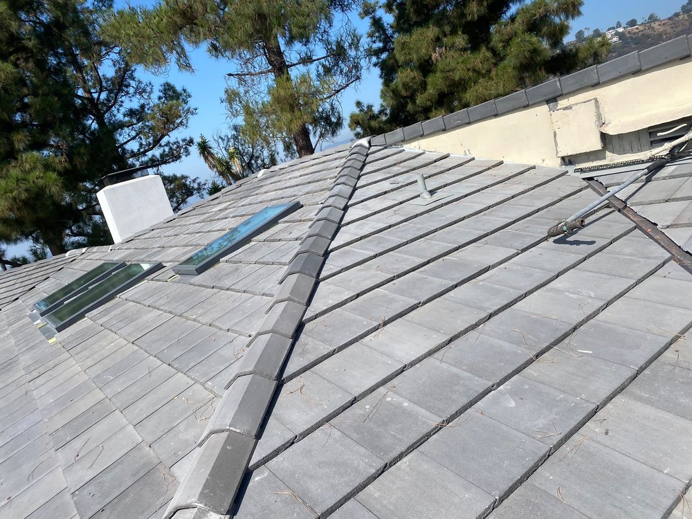 Slide of United Frontier Roofing