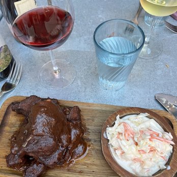 Kaia Wine Bar - Ribs with uniquely flavored sauce. - South African Near Me - New York, New York