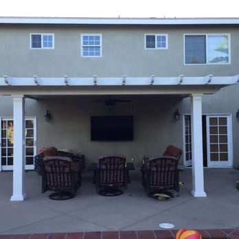 Patio Warehouse - Patio cover with ceiling fan and triple light source. - Patio Coverings Near Me - Orange, California Patio Warehouse - Patio cover with ceiling fan and triple light source. - Patio Coverings Near Me - Orange, California