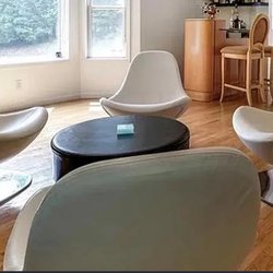 4 chairs and leather table that opens for storage.