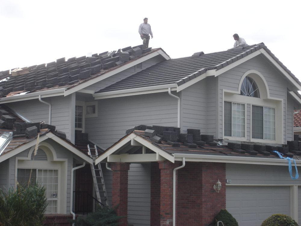 Slide of TNT Roofing