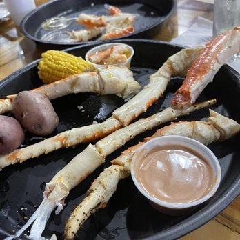 Cajun Claws Seafood Boilers - King crab...was prettier when it first arrived but we had already attacked by the time we took this photo. It was great! - Seafood Near Me - Rayne, Louisiana