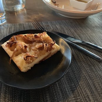 Great Road Kitchen - Caramelized-onion focaccia with dipping oil - New American Near Me - Littleton, Massachusetts Great Road Kitchen - Caramelized-onion focaccia with dipping oil - New American Near Me - Littleton, Massachusetts