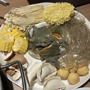 Laojie Hotpot - Soup ingredients including instant noodles and glass noodles, crab, dumplings, corn, mushrooms - Hot Pot Near Me - Brooklyn, New York Laojie Hotpot - Soup ingredients including instant noodles and glass noodles, crab, dumplings, corn, mushrooms - Hot Pot Near Me - Brooklyn, New York