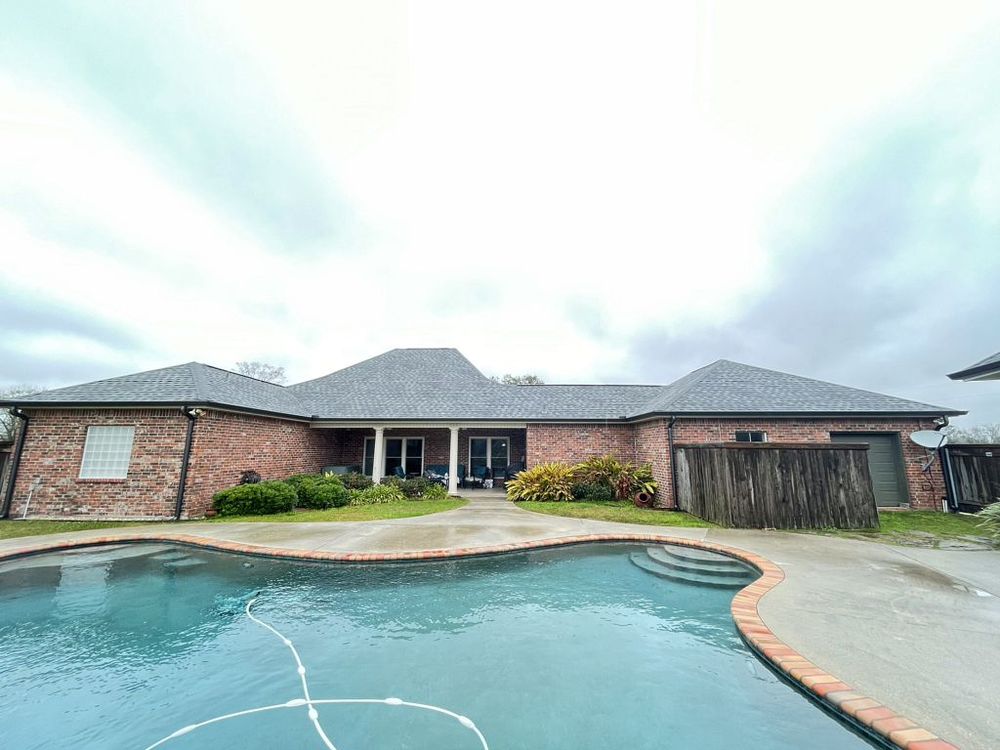 Slide of Pelican Roofing Company