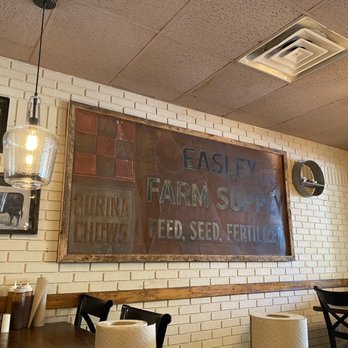 Smokin Pig - a sign in a restaurant - Barbeque Near Me - Easley, South Carolina