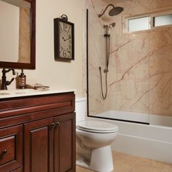 Custom solid wood vanity with matching mirror.
