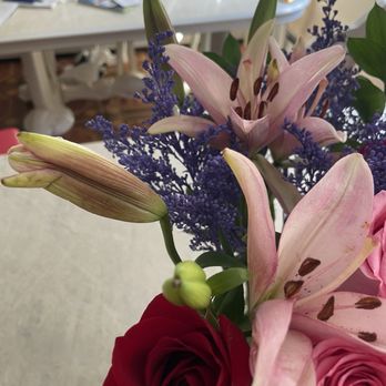 Designs By Guzzardos - Weak lily, one of them petals barely hanging on, fell off soon after delivery. - Florists Near Me - Melrose Park, Illinois