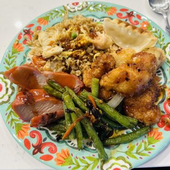 Golden Palace - a plate of food on a table - Chinese Near Me - Battle Ground, Washington Golden Palace - a plate of food on a table - Chinese Near Me - Battle Ground, Washington