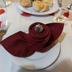 Mimo's Pizzeria - Napkins folded into rose's for Valentine's Day