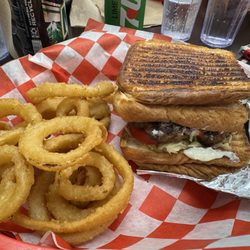 GR's Sandwich Shoppe - Monster burger wrapped by two grilled cheese and onion rings.