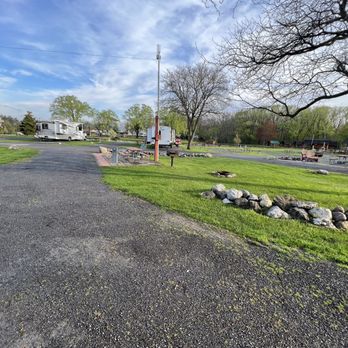Canandaigua / Rochester KOA - Patio site - Campgrounds Near Me - Farmington, New York