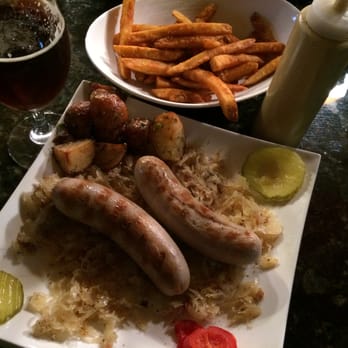 Bistro Gambrinus - Bratwurst on a bed of Sauerkraut with Roasted Potatoes, a side of Fries, and a Duchesse Flemish Sour Red Ale (on tap here!!!) - Sports Bars Near Me - San Francisco, California