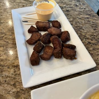 Harrigan's Pub - Deep fried streak bites. They look weird but were pretty decent according to the person who ordered them. Still tender. - Pubs Near Me - Hatboro, Pennsylvania Harrigan's Pub - Deep fried streak bites. They look weird but were pretty decent according to the person who ordered them. Still tender. - Pubs Near Me - Hatboro, Pennsylvania