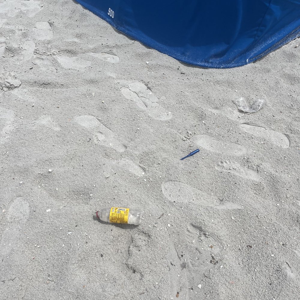 Opal Sands - Trash on beach - Resorts Near Me - Clearwater Beach, Florida Opal Sands - Trash on beach - Resorts Near Me - Clearwater Beach, Florida