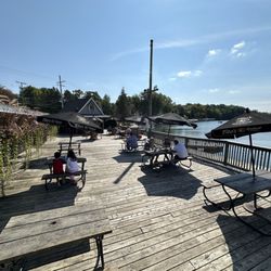 White Lake Inn Restaurant & Bar - Outdoor seating on the back porch.