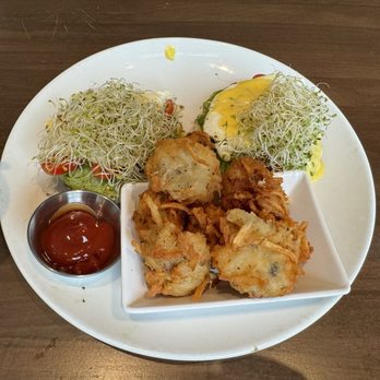Honey Seed - Smashed avocado tomato Benedict with tater tots - Bagels Near Me - Chattanooga, Tennessee