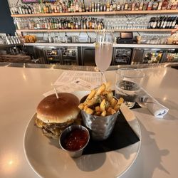 Social hour Smash burger + truffle fries + Rotating French 75