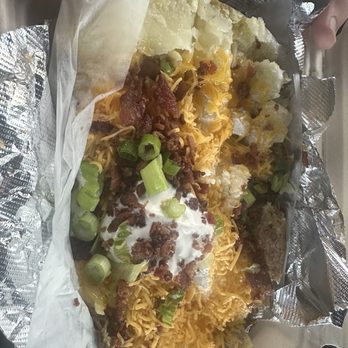 Fat Dogs & Spuds - This is a huge baked potato with all the fixings . Yum !!! - Hot Dogs Near Me - Fair Oaks, California