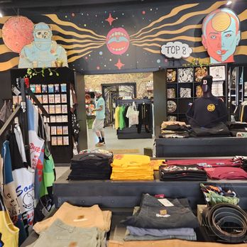 Everything Ellum - back wall of Everything Ellum with shirt tables - Women's Clothing Near Me - Dallas, Texas Everything Ellum - back wall of Everything Ellum with shirt tables - Women's Clothing Near Me - Dallas, Texas