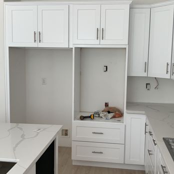 Home Remodeling - The kitchen was remodeled with a white shaker and a light gray Calcutta countertop. - General Contractors Near Me - North Hollywood, California Home Remodeling - The kitchen was remodeled with a white shaker and a light gray Calcutta countertop. - General Contractors Near Me - North Hollywood, California