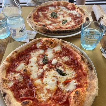 Gusta Pizza - Margarita and spicy salami pizza - Italian Near Me - Florence, FI Gusta Pizza - Margarita and spicy salami pizza - Italian Near Me - Florence, FI