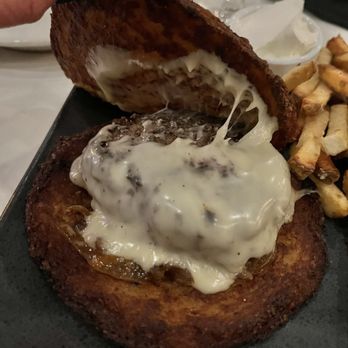 Sto Lat Bar - Potato Pancake Burger - potato pancakes were super crispy, cheese was ooey gooey, and caramelized onions brought a rich flavor - Bars Near Me - Buffalo, New York