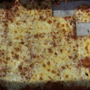 DePetrillo's Pizza & Bakery - Cheese Pizza (my kids grabbed a square before I was able to grab a photo) - Pizza Near Me - North Providence, Rhode Island DePetrillo's Pizza & Bakery - Cheese Pizza (my kids grabbed a square before I was able to grab a photo) - Pizza Near Me - North Providence, Rhode Island