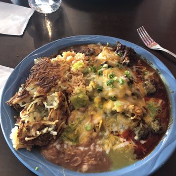 MartAnne's - Chilaquiles with chorizo and red & green sauce ( Christmas). Soooo tasty!!!! - Breakfast & Brunch Near Me - Flagstaff, Arizona