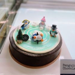 Paris Baguette - Penguin pound chocolate cake. uh-oh, one penguin fell down